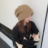 2021 New Korean-style woolen cap for children's autumn and winter headwear warm knitted cap, black thickened versatile pile cap details Picture